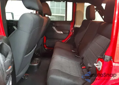 2011 Jeep Wrangler Unlimited Sahara z USA, uszkodzony, nr VIN 1J4BA5H12BL520079